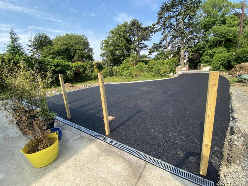 Tarmacadam driveway with kerbing and drainage6