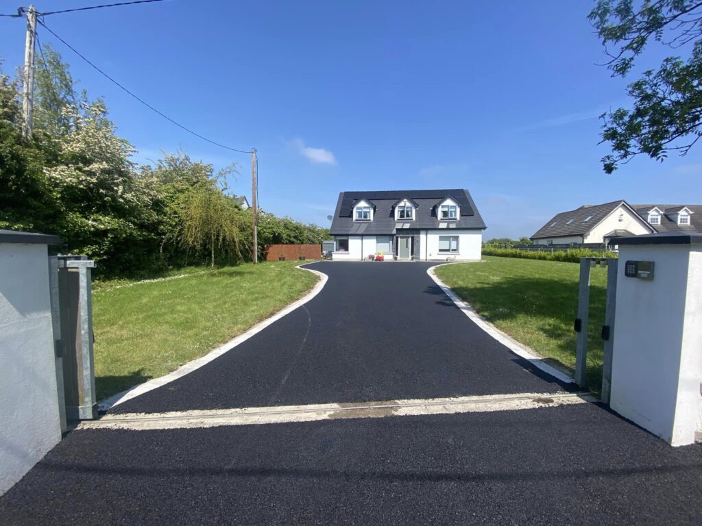 Tarmac driveway with silver granite borders