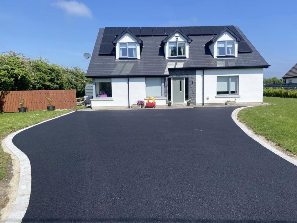 Tarmac driveway with silver granite borders