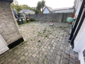 Cleaning and grouting a patio