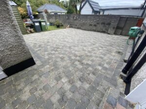 Cleaning and grouting a patio