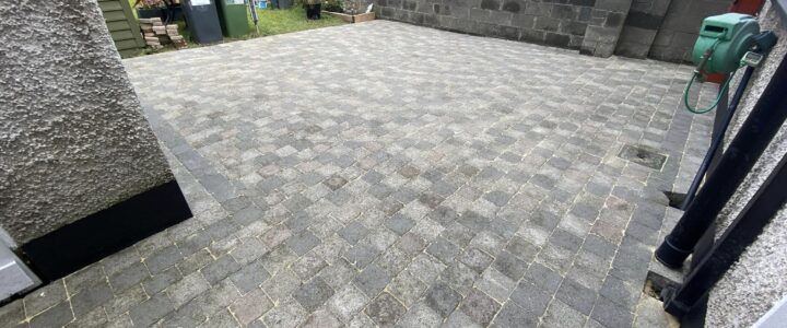 Cleaning and grouting a patio