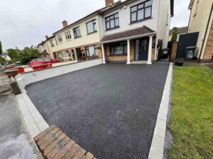 New Asphalt Driveway Completed with Silver Granite Border
