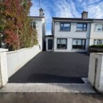 Newly installed tarmacadam driveway with silver granite border at a residential property in Blanchardstown, Dublin.
